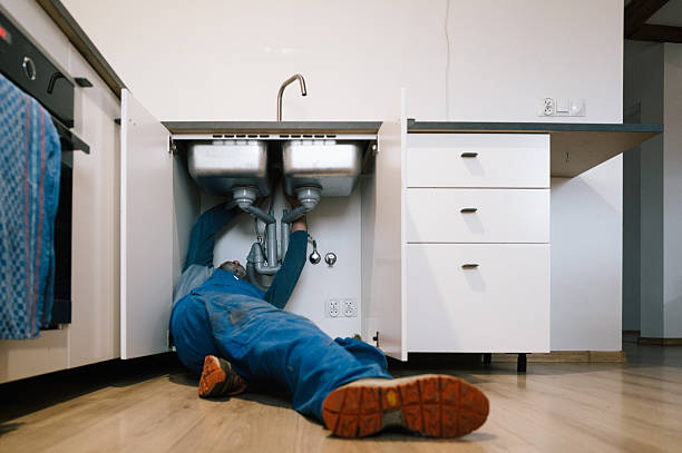 Professional Drain Cleaning technician working in Athens, TX